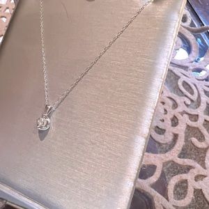 10 kt white gold necklace/diamond pendant/matching  diamond solitaire earrings.